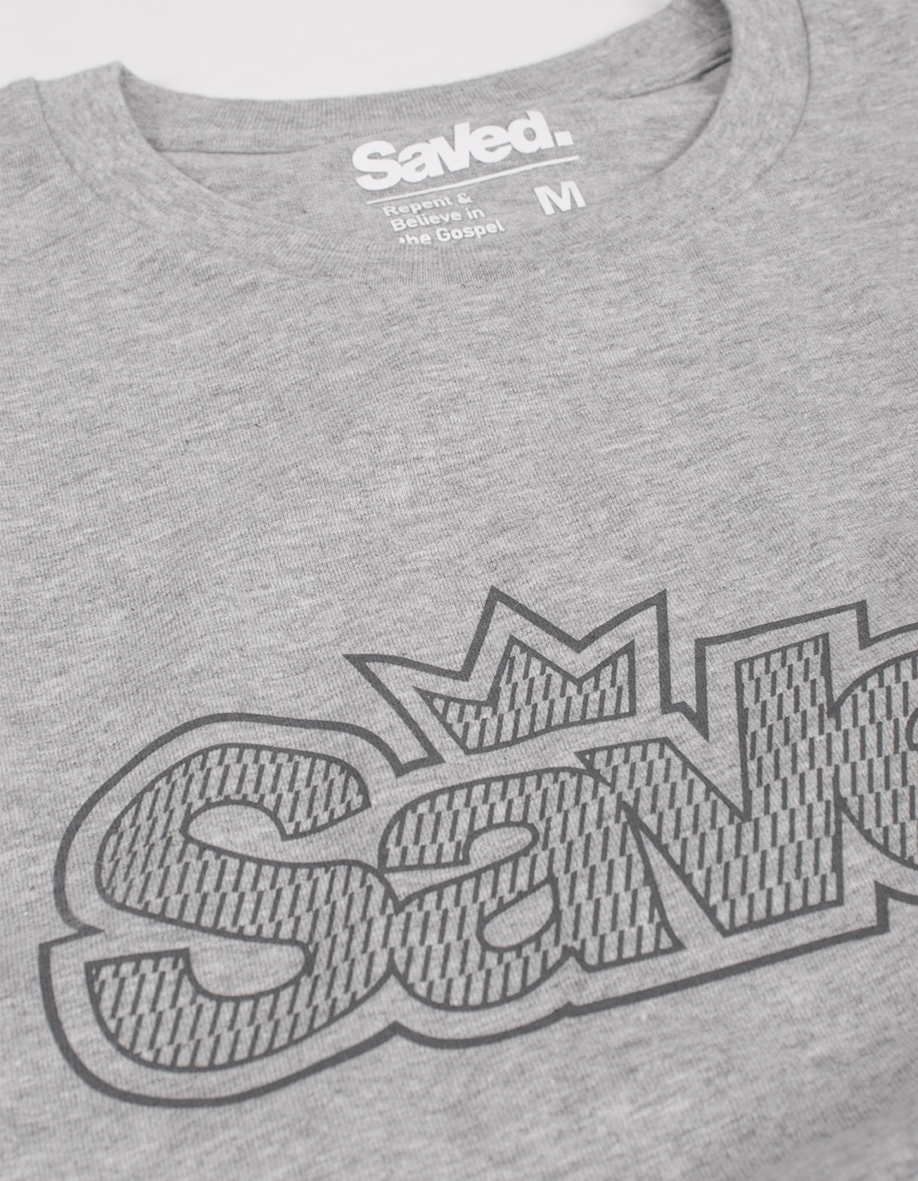 koszulka chrześcijańska Saved kolor heather grey z nadrukiem logo Saved z przodu